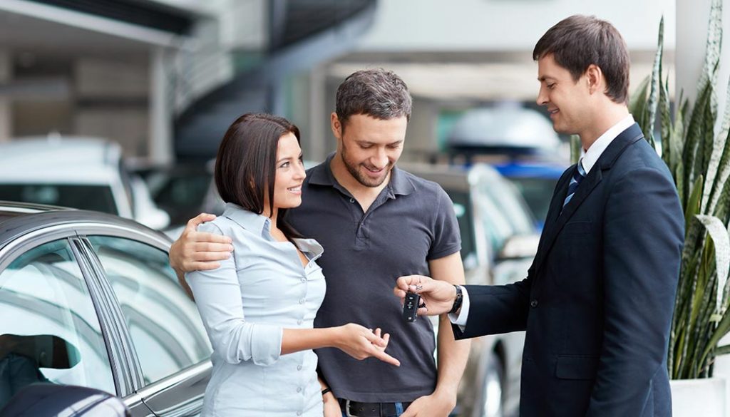 A couple in the process of buing a used car