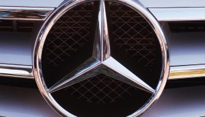 Mercedes-Benz logo amid an emissions scandal