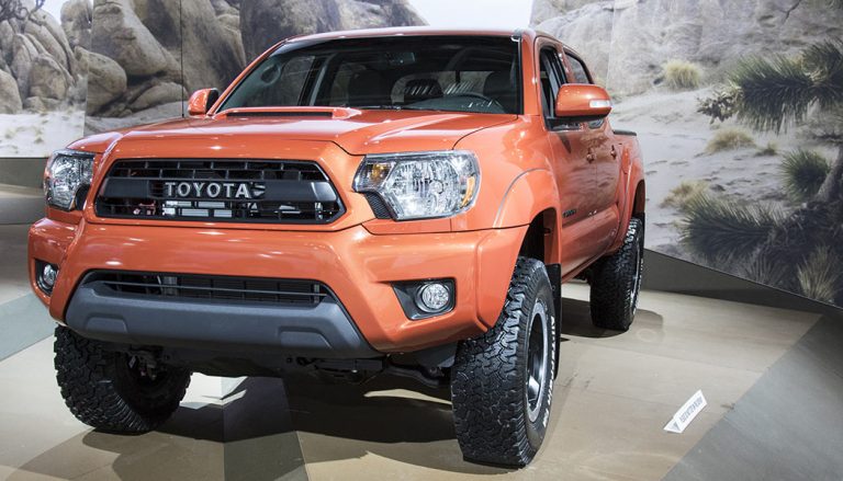 An orange 2016 Toyota Tacoma