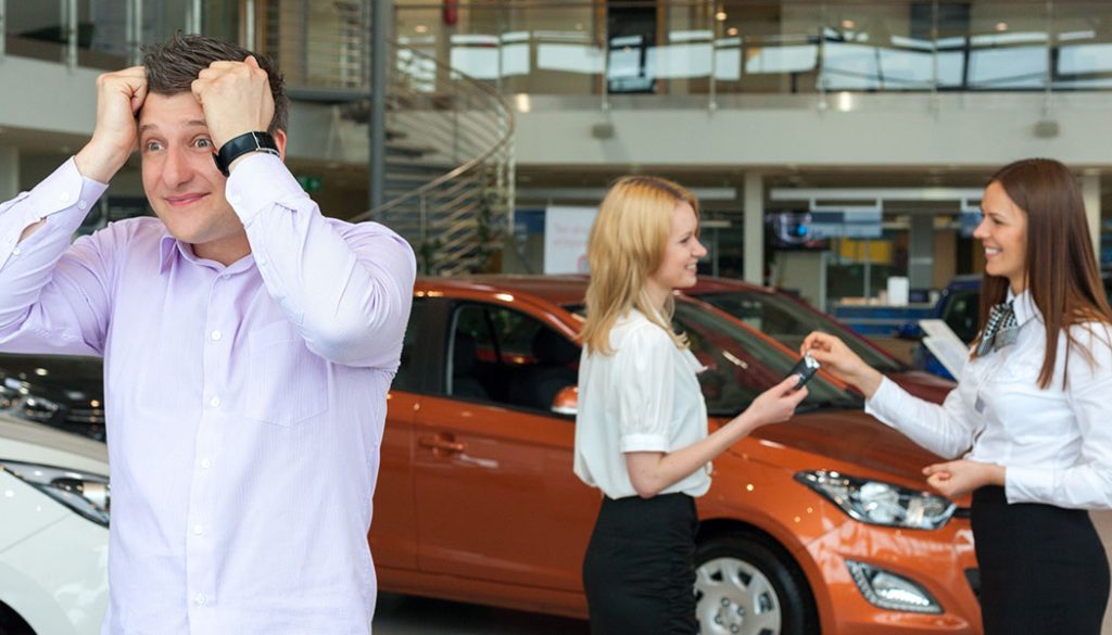 A man shows frustration car shopping with his partner