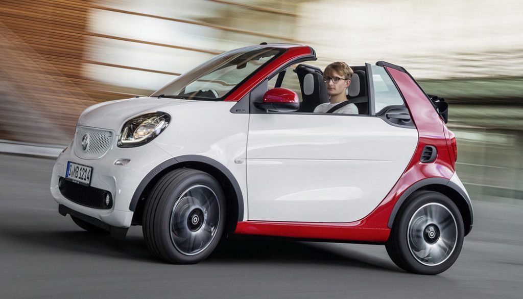 A man drives a succinct 2017 Smart Cabrio