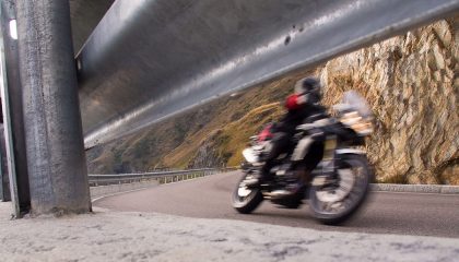 A rider avoids motorcycle accidcents on a curvy road