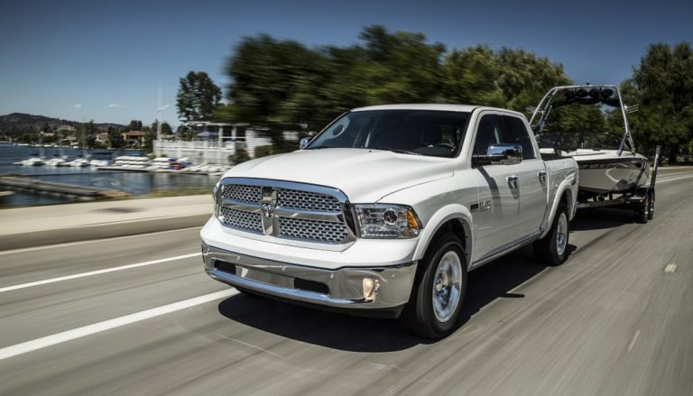 A 2017 Ram 1500 truck tows a large boat