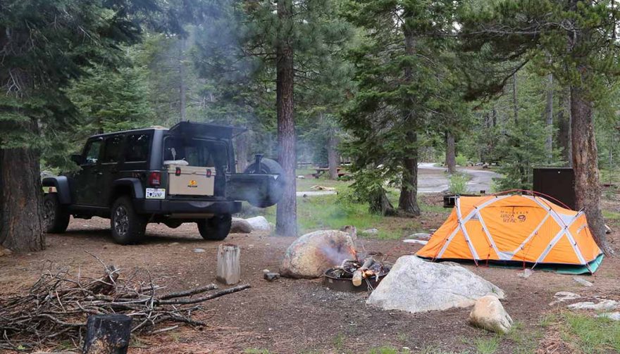 A tight cooler for food storage is a must-have accessory for SUV camping