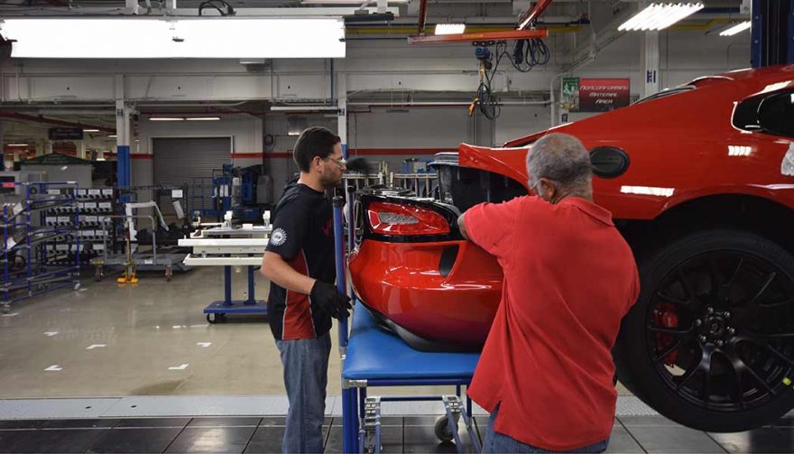 Employees at the Viper factory put a car together