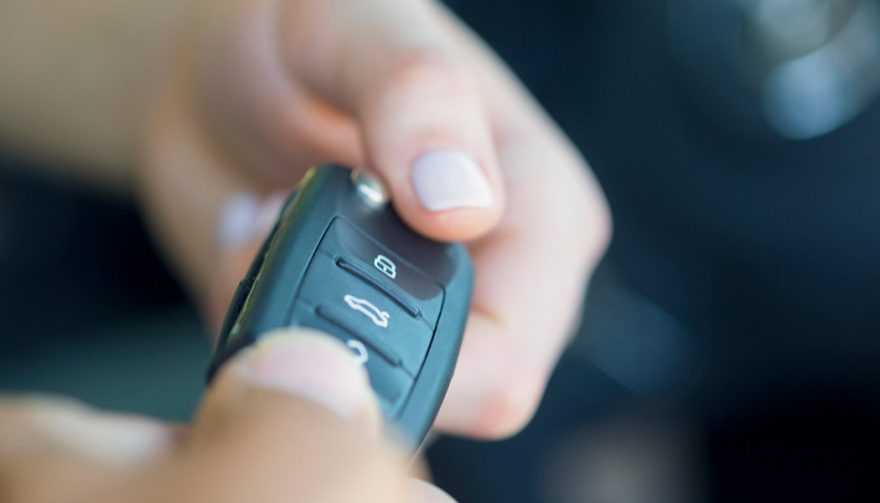 A dealer uses the four square car sales method before handing over the keys